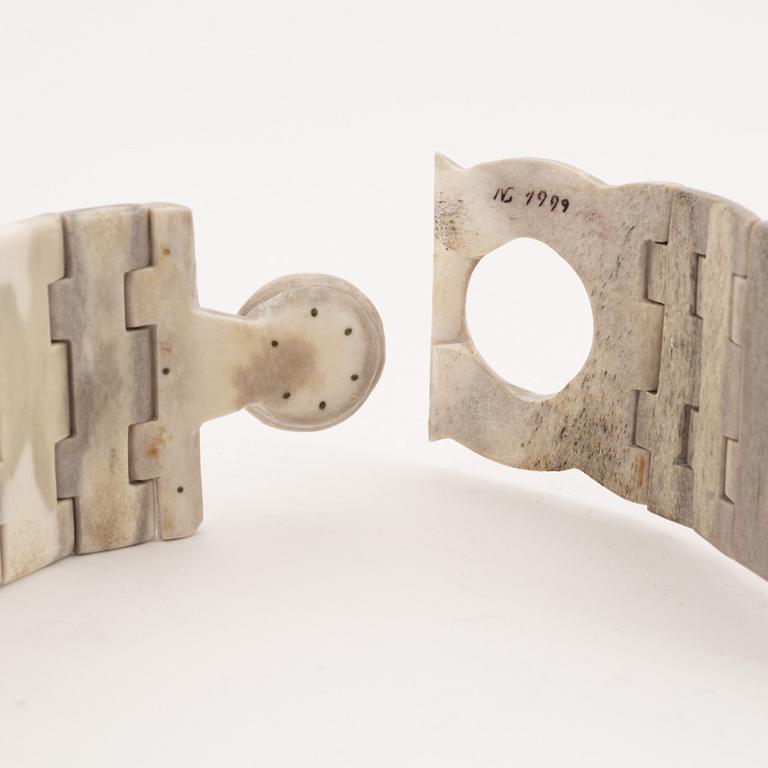 A reindeer horn belt by Gunnar Svonni, signed and dated 1999.
