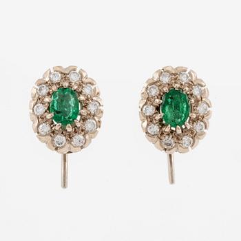 Earrings, carmosé. white gold with emeralds and brilliant-cut diamonds.