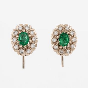 Earrings, carmosé. white gold with emeralds and brilliant-cut diamonds.