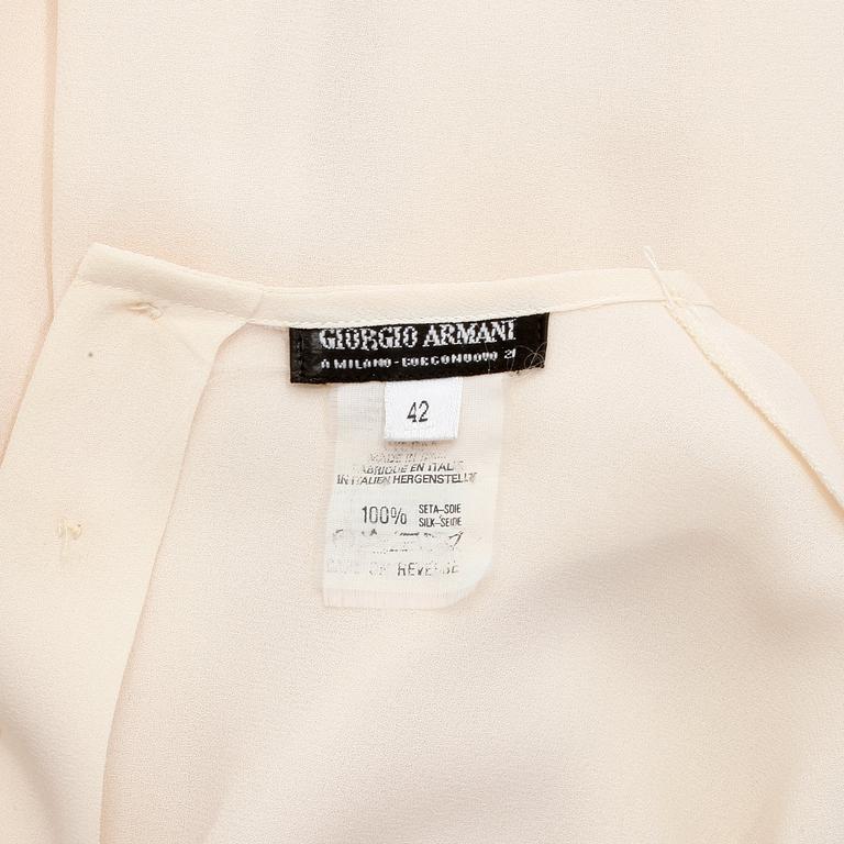 GIORGIO ARMANI, a créme colored silk blouse, size 42.