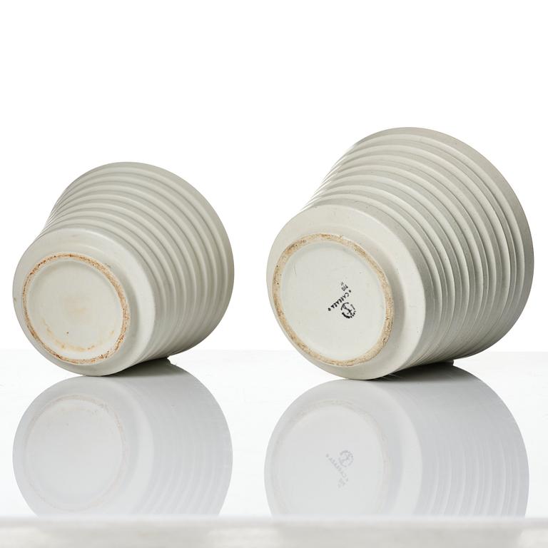 Wilhelm Kåge, A set of three ceramic flower pots, a vase and jar with lid,  Gustavsberg 1930s.