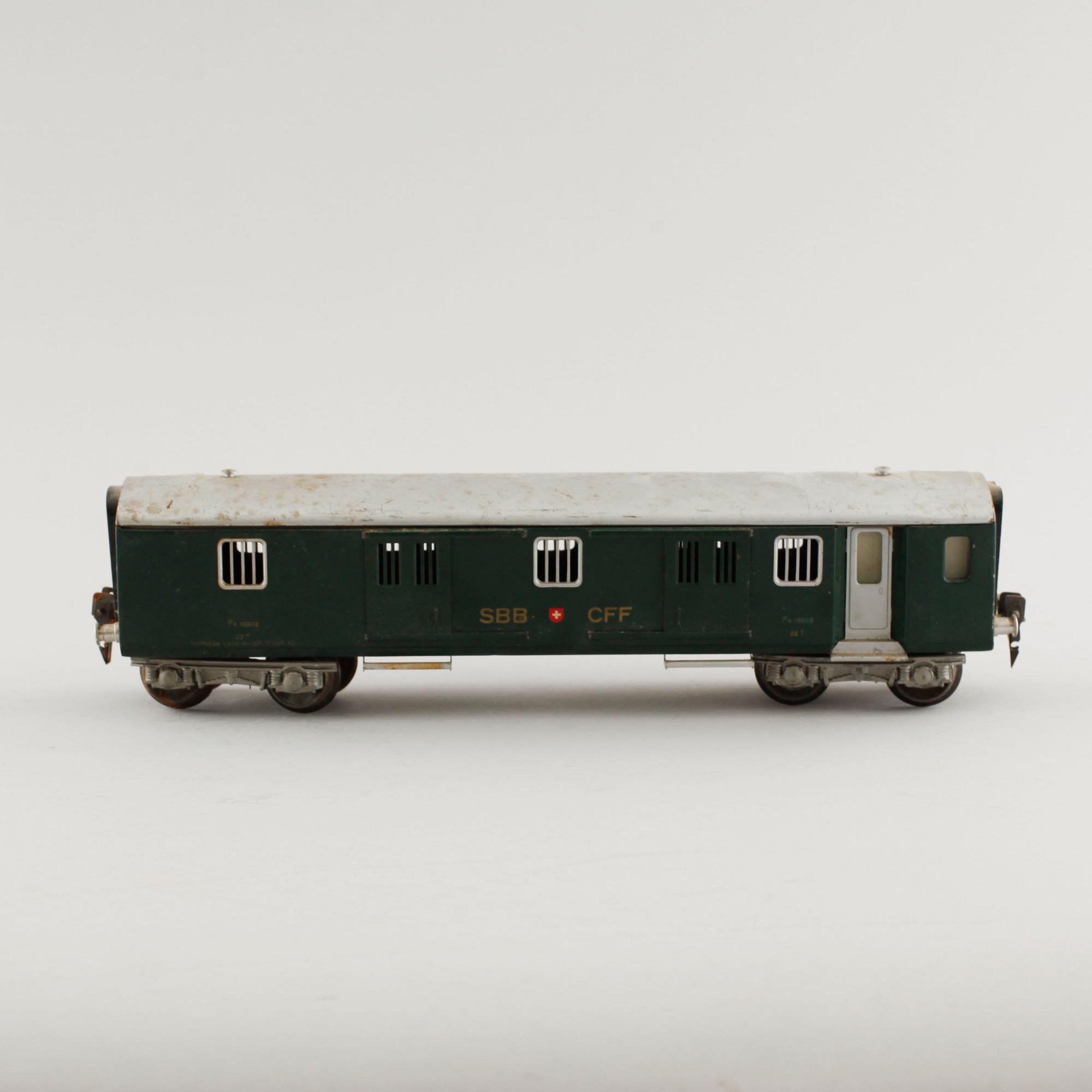 A 1940/50s model train set of 31 pcs in O-scale made by HAG, Switzerland.
