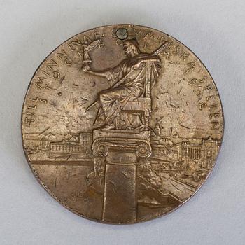 A bronze participant medal from the 1912 olympic games in Stockholm.