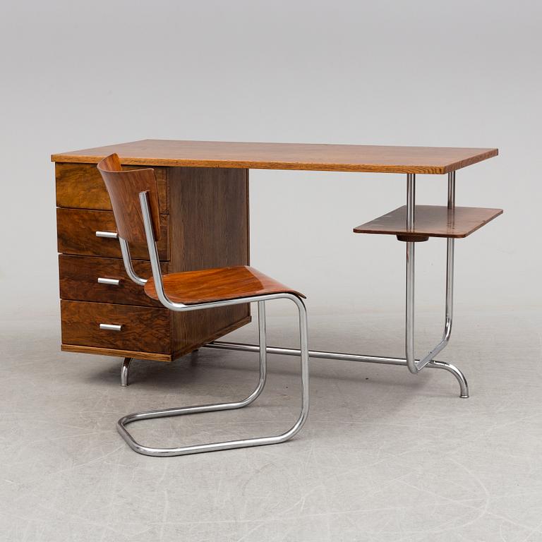 A 1930s writing desk by Jindrich Halabala and chair by Mart Stam.