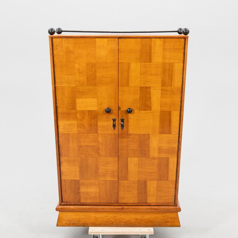 An Art Deco cabinet from the first half of the 20th century.
