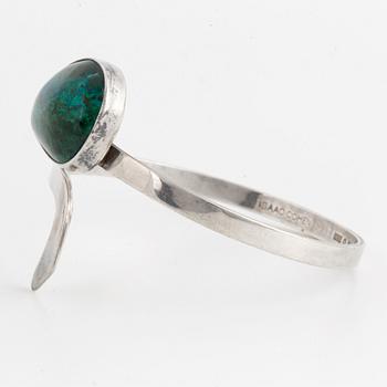 Isaac Cohen silver bangle with green stone.