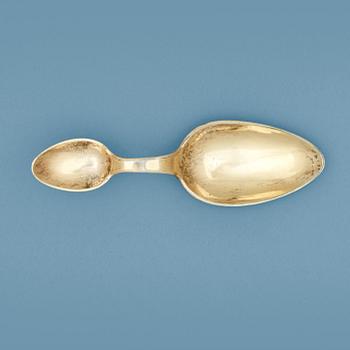 936. A Swedish 19th century silver-gilt medicine-spoon, marks of Jonas Lindberg, Stockholm 1827.