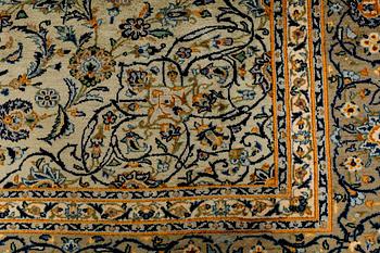 A Keshan rug, signed, ca 370 x 268 cm.