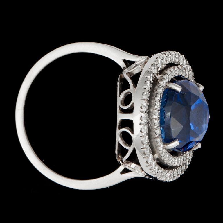 A 11.84 cts untreated ceylon sapphire and brilliant-cut diamonds, total carat weight 0.70 ct, ring.