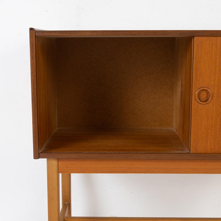 A teak dresser and mirror, 1960s.