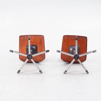 A pair of swivel chairs, contemporary.