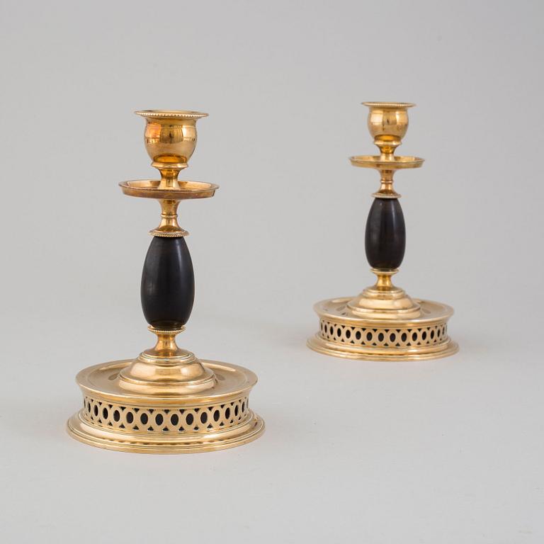 a pair of Skultuna candlesticks from the first half of the 20th century.