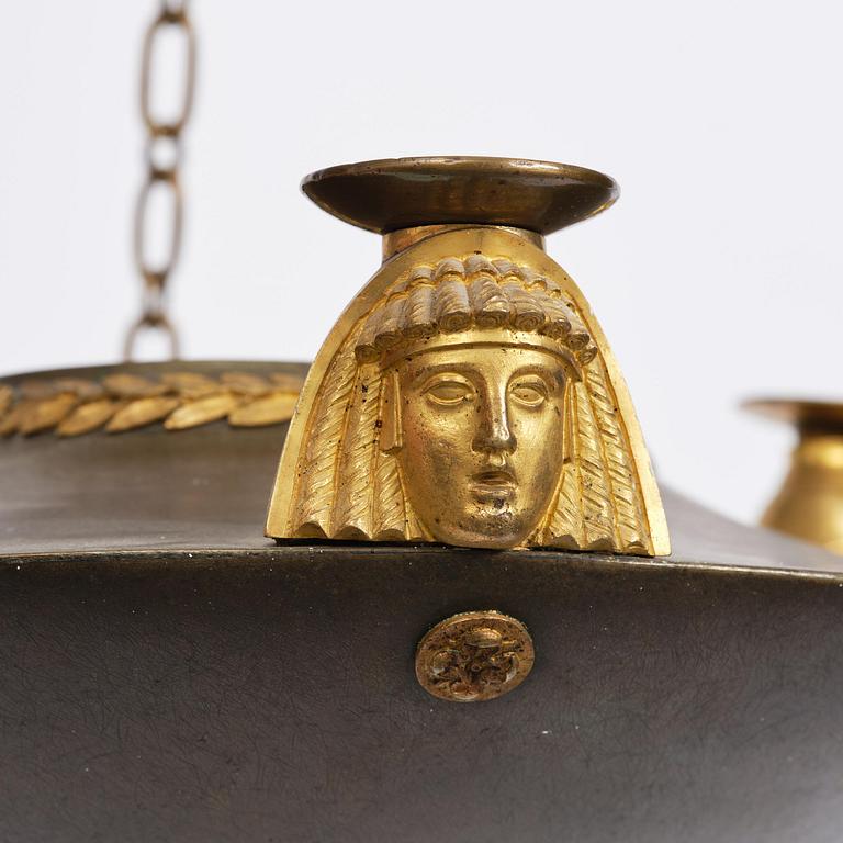 A Swedish Empire 19th century three-light hanging-lamp.