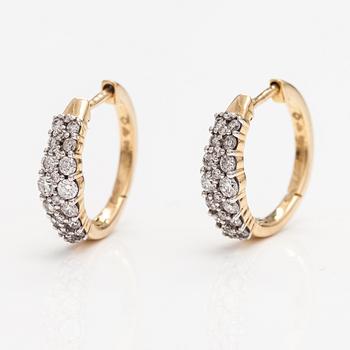 A pair of 14K gold earrings with diamonds ca. 0.42 ct in total. Timanttiset, Helsinki.