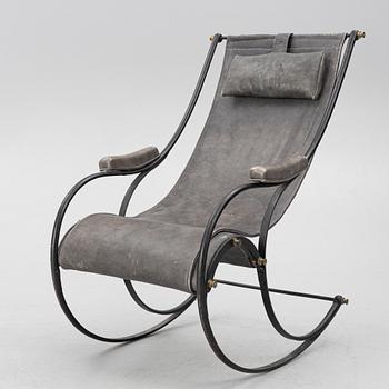 An iron rocking chair, R.W Winfeild & Company, England, late 19th century.