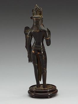 A Sino-Tibetan bronze figure of Padmapani, standing in slight tribhanga pose, 18th Century.