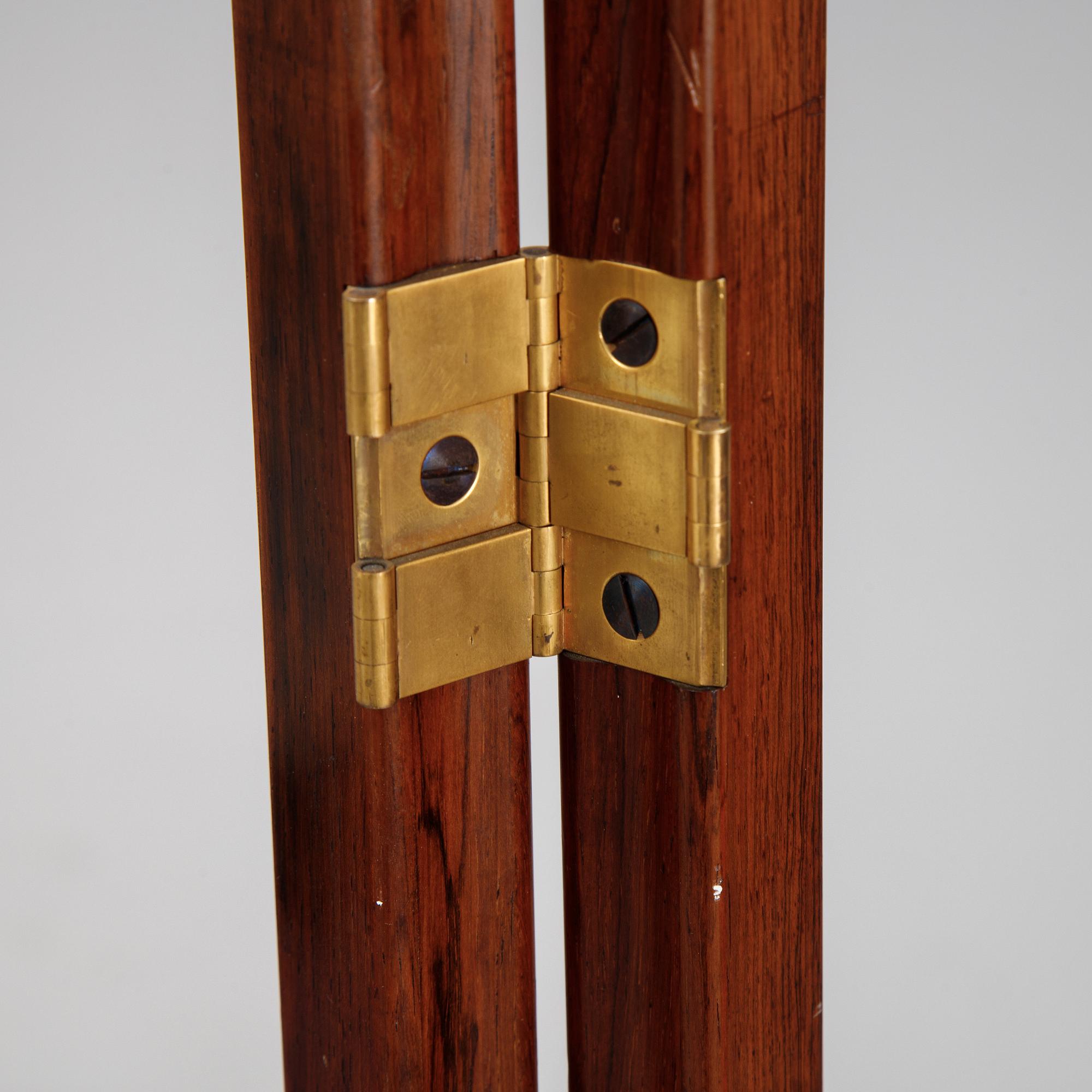 An early 20th century folding screen.