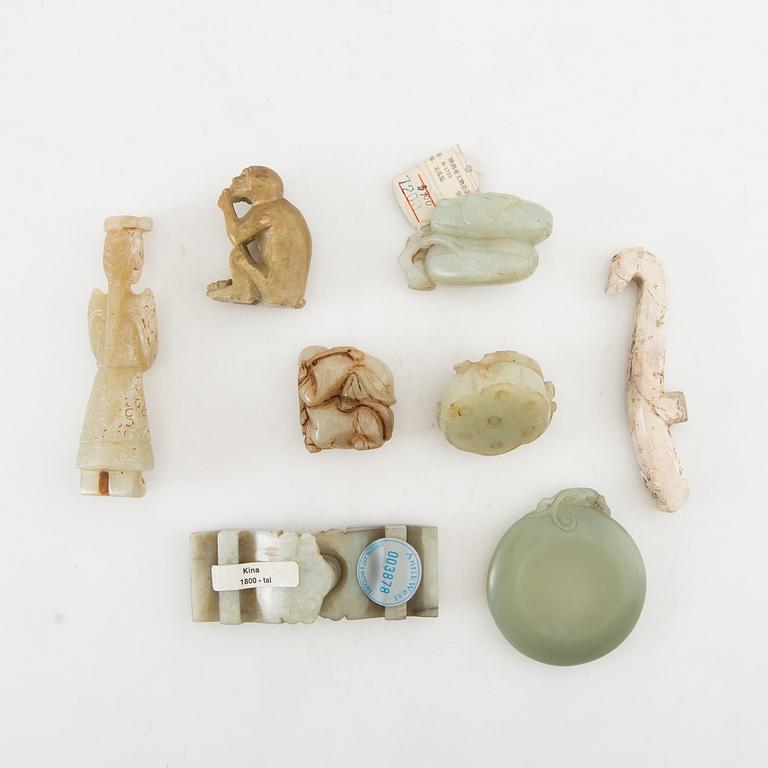 Figurines, belt buckles etc. China.