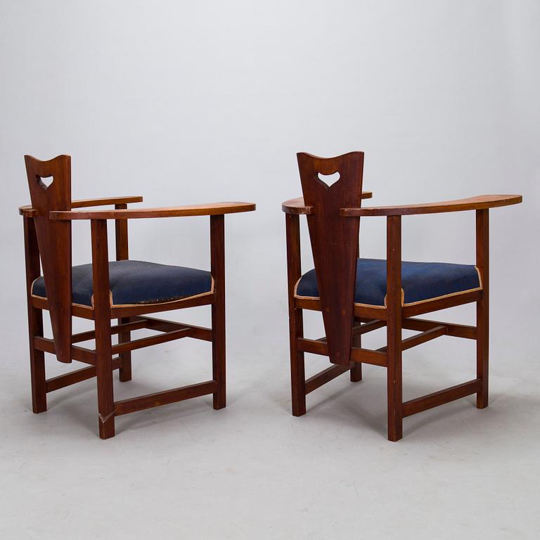 A pair of Arts and Crafts armchairs, early 20th century.