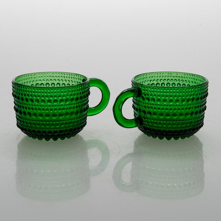 A set of 12 punch cups in glass "Kastehelmi" by Oiva Toikka, Arabia. Finland.