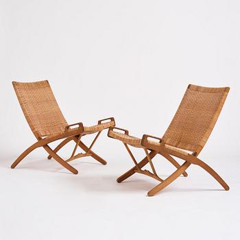 Hans J. Wegner, a pair of oak and rattan folding chairs 'JH-512', Johannes Hansen, Denmark 1950-60s.