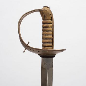A Swedish cavalry saber with scabbard, 1893 pattern.