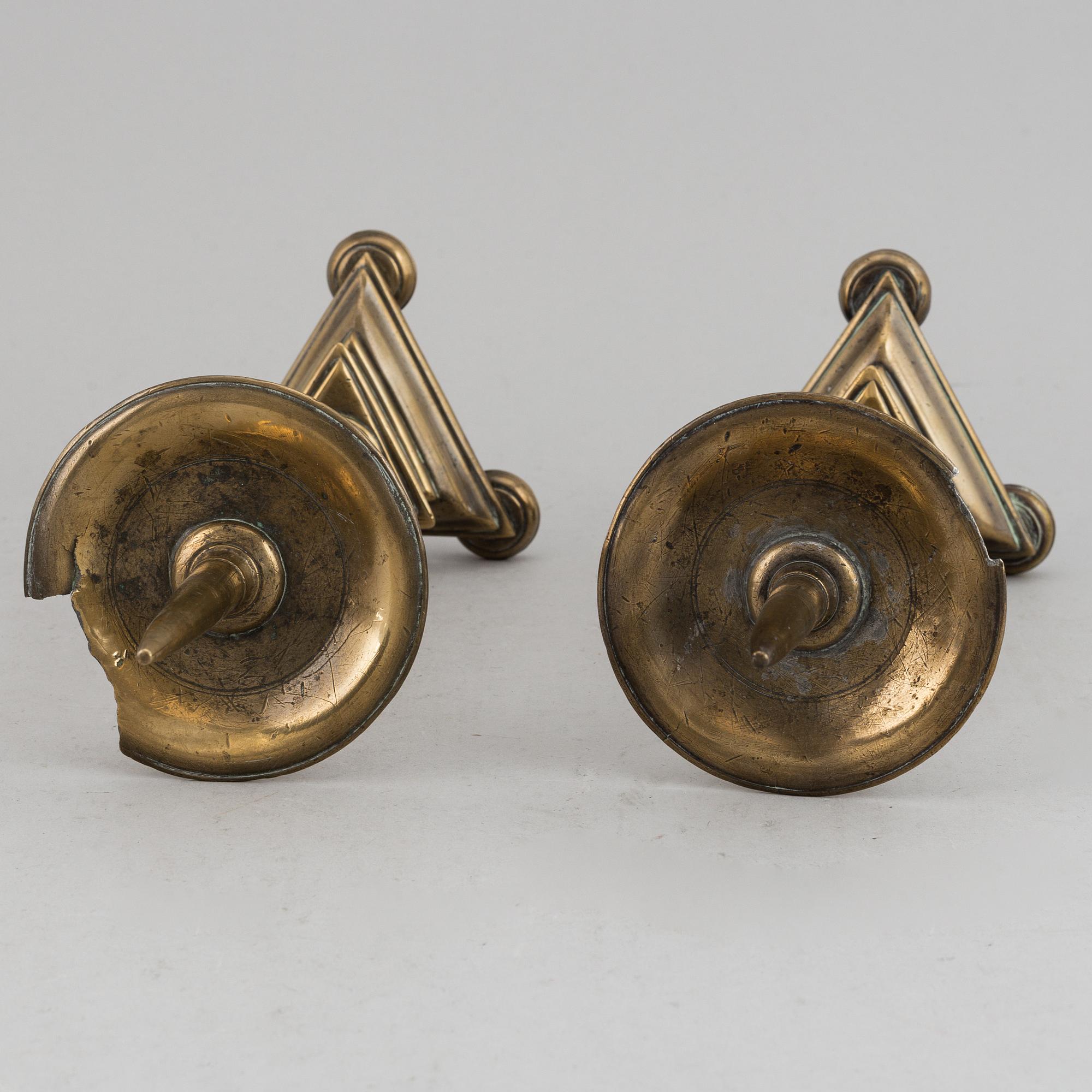 A pair of 17th century bronze candlesticks.