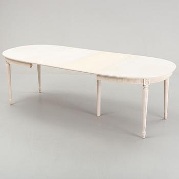A dining table with eight chairs and a stool, Gustavian style, second half of the 20th Century.