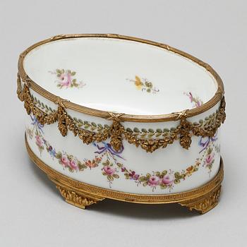 A porcelain bowl with a mark similar to Sèvres, around the year 1900.