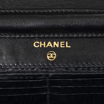 Chanel, A black suede vintage purse / wallet on chain.