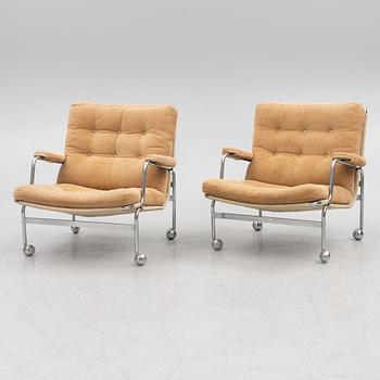 Bruno Mathsson, a pair of 'Karin' lounge chairs, Dux, second half of the 20th century.