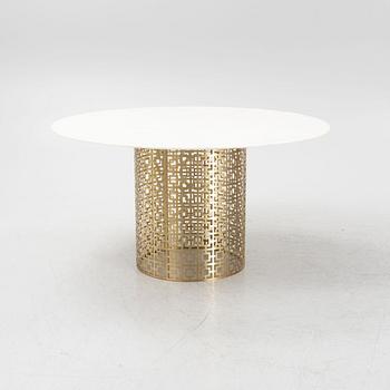 Jonathan Adler, a 'Nixon' marble and brass dining table.