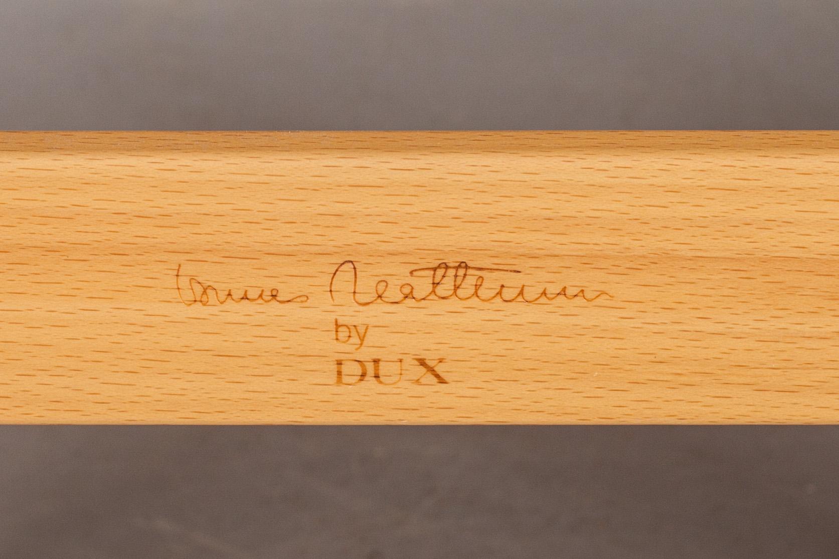 FÅTÖLJ samt FOTPALL, "Ingrid", Bruno Mathsson, Dux, brännmärkt.