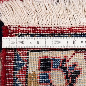 A Persian carpet. ca 400 x 260 cm.