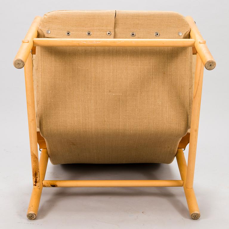 BROR BOIJE, A pair of 'Junker' easy chairs and an ottoman for Dux, Sweden, latter half of the 20th Century.