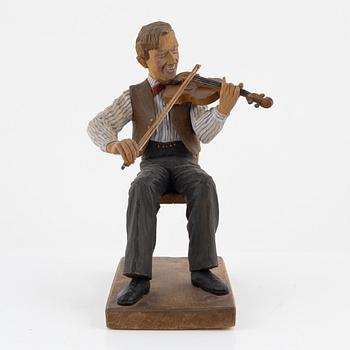 Herman Rosell, a carved and painted wood sculpture, signed HR and dated 1945.