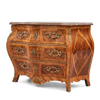 6. A rosewood-veneered and ormolu-mounted Rococo chest of drawers by J. Wahlbeck (master 1760-1782).
