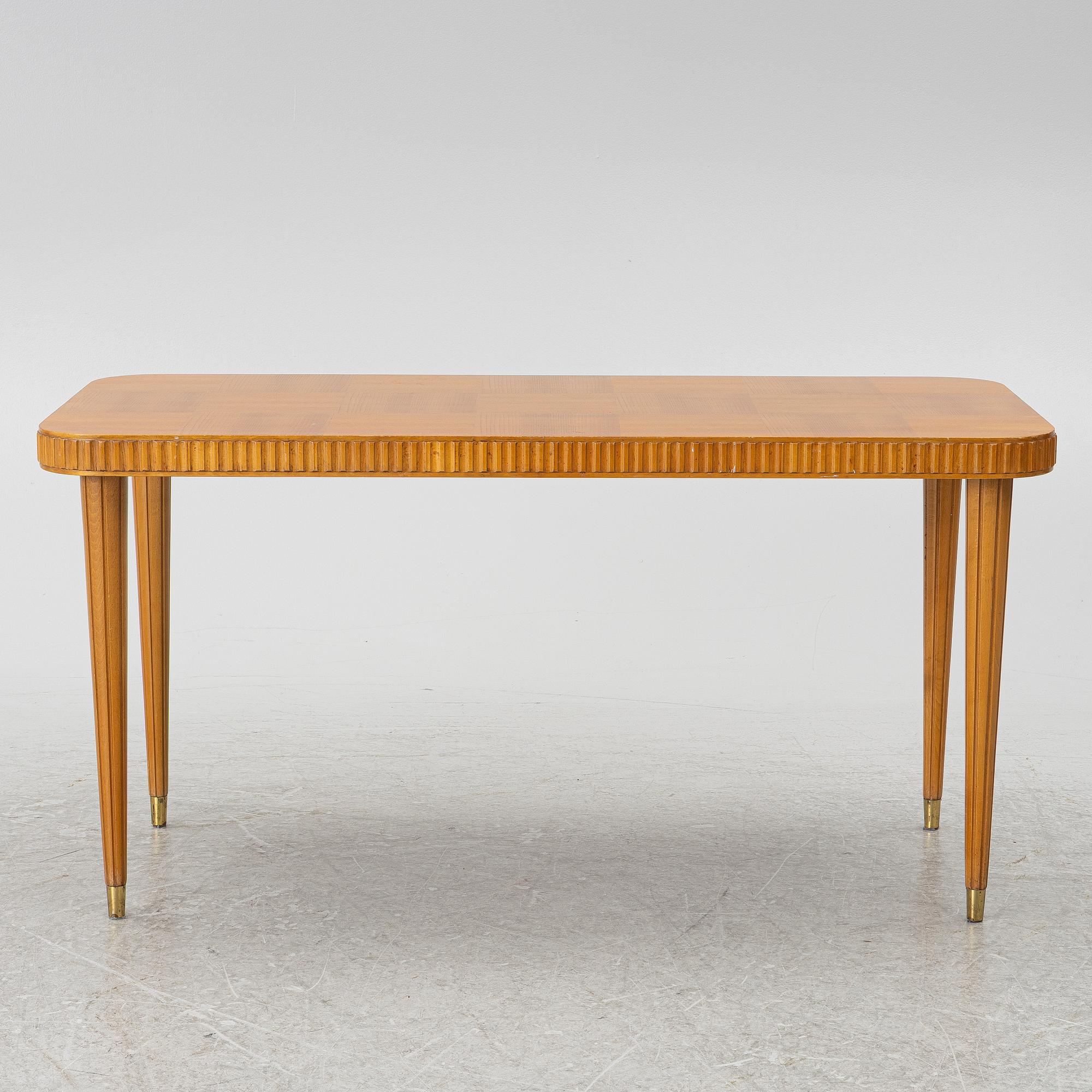 A Swedish Modern coffee table, 1940s.