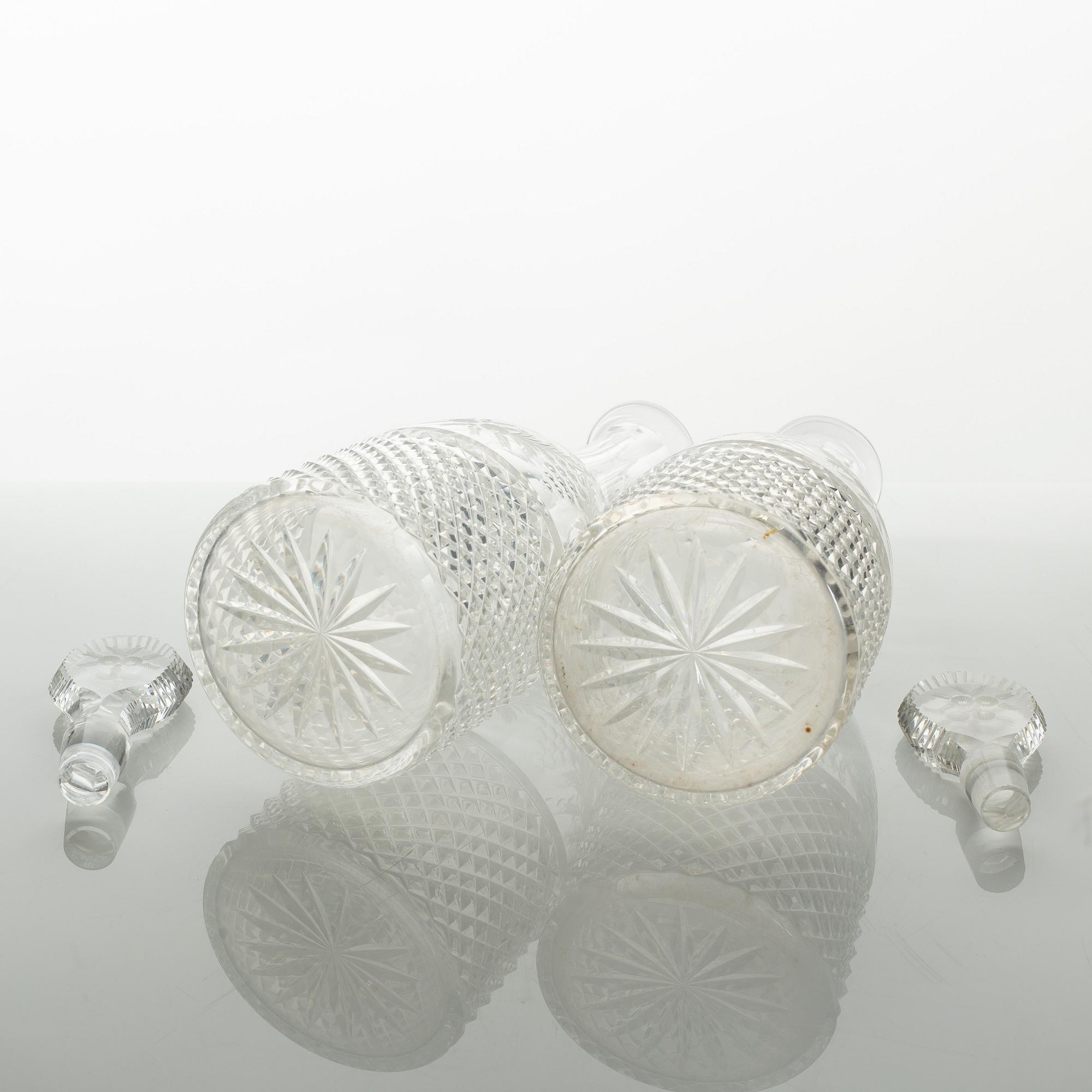 Two glass decanters, around the year 1900.