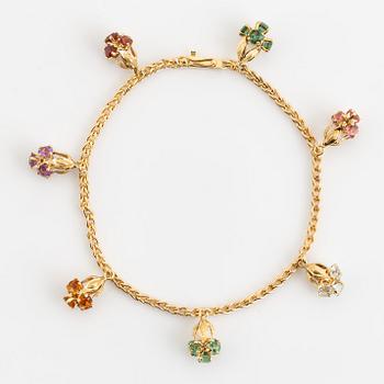 Gold and coloured stone charm bracelet.