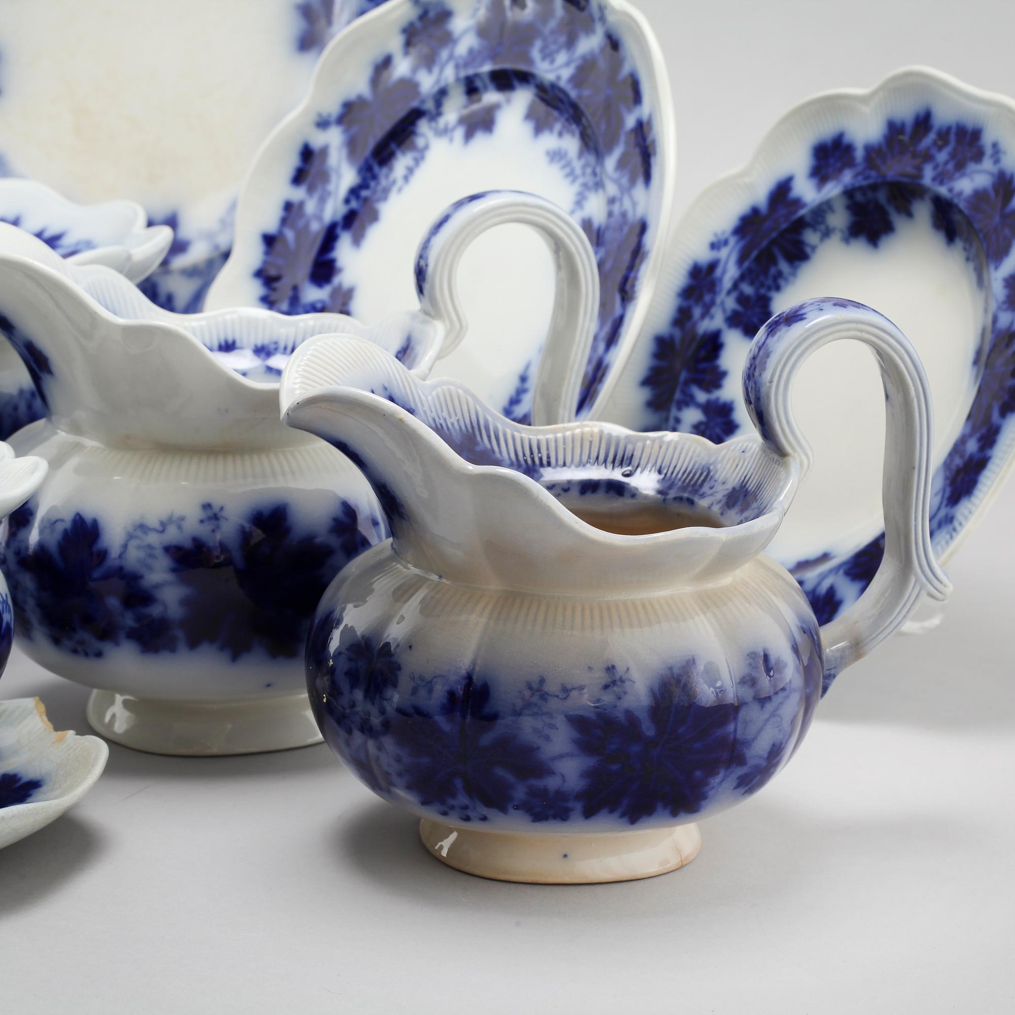 77 pieces of earthenware tableware by Arthur Percy for Gustavsberg, model "Vinranka", first half of the 20th century.