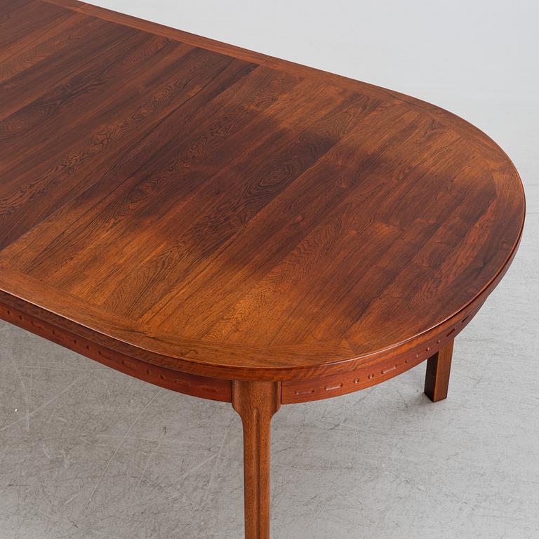 A rosewood-veneered dining table, Hugo Troeds, Björnum, Sweden, 1960's.