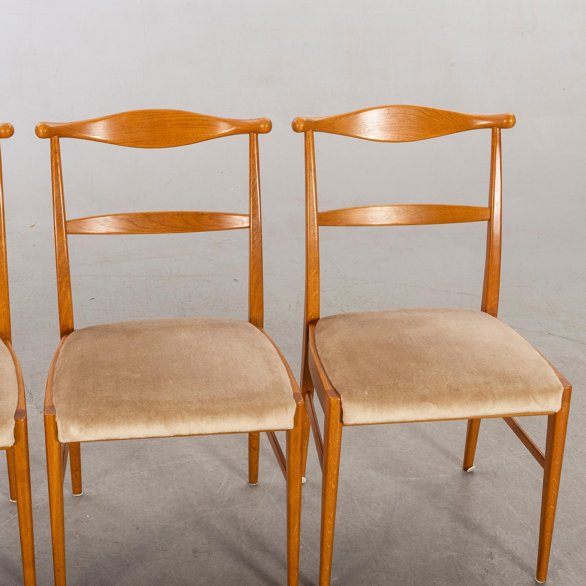 A set of four 1960:s oak chairs.