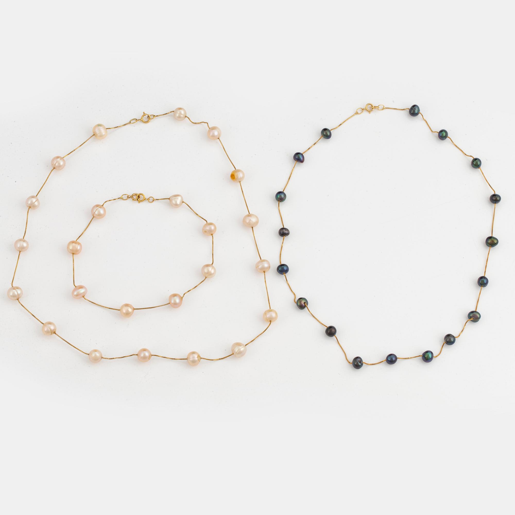 Two cultured pearl necklaces and cultured pearl bracelet.