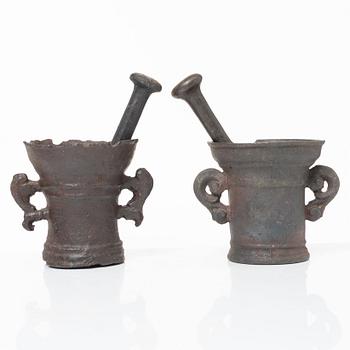 A set of two renaissance-type cast-iron mortars, 17th century.