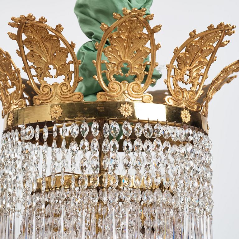 An Empire twelve-light chandelier, early 19th century.