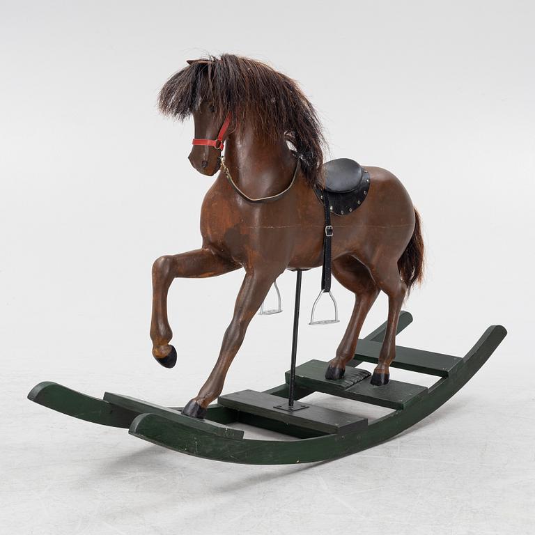 An early 20th century rocking horse.