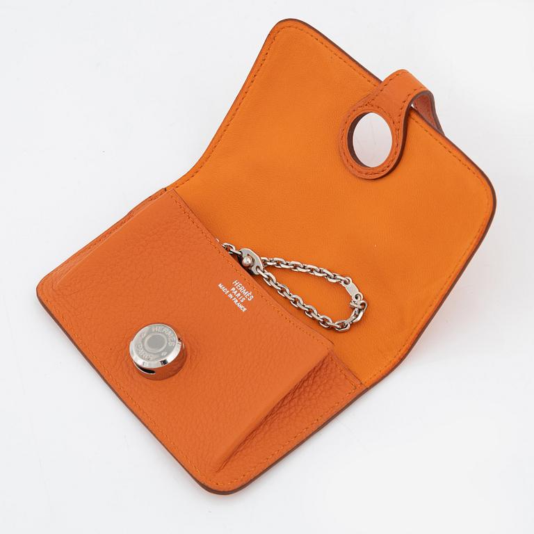 Hermès, a orange leather 'Dogon' wallet, 1998.