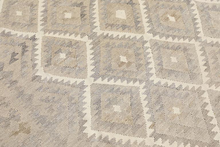 A Kelim carpet, c. 222 x 163 cm.