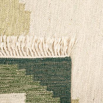 A flat weave carpet approx 230x170 cm.